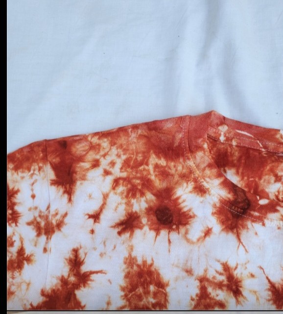 Rust crumple hand-dyed textile detail